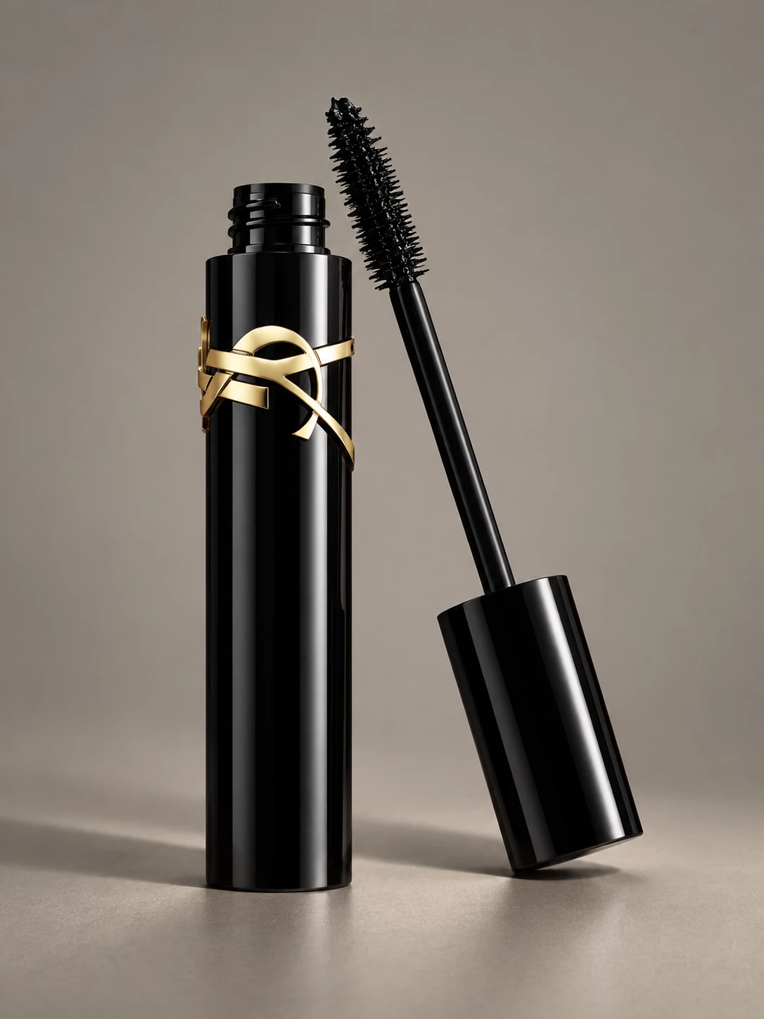 Open black YSL mascara with gold logo and brush
