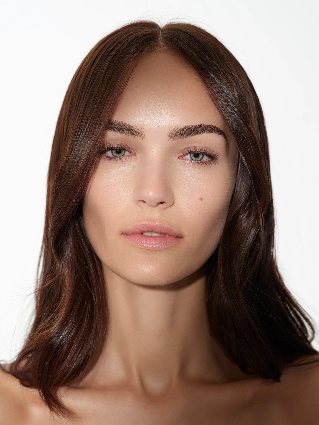 Frontal beauty portrait of Julia Wess with natural makeup
